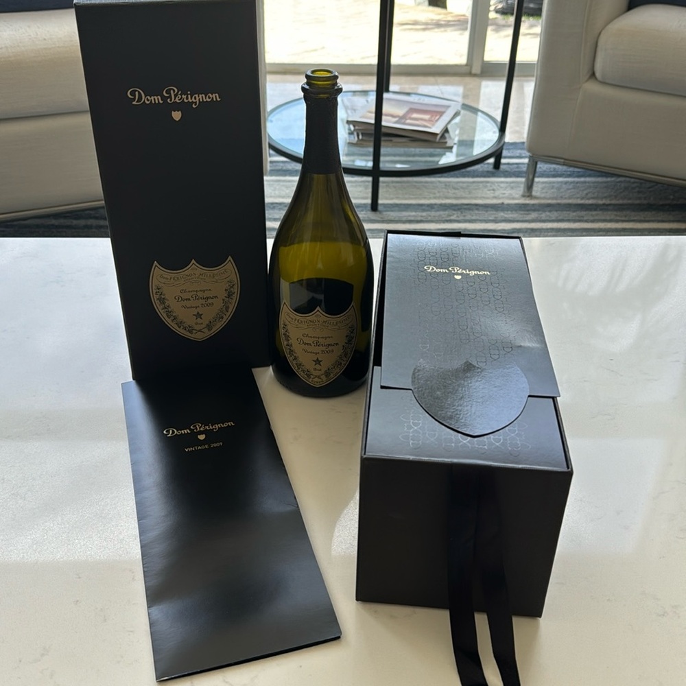 Dom Perignon vintage 2009 packaging with opened bottle.